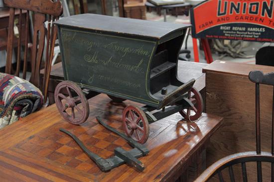 Appraisal: PAINTED WOODEN WAGON Toy or advertising horse-drawn moving and freight