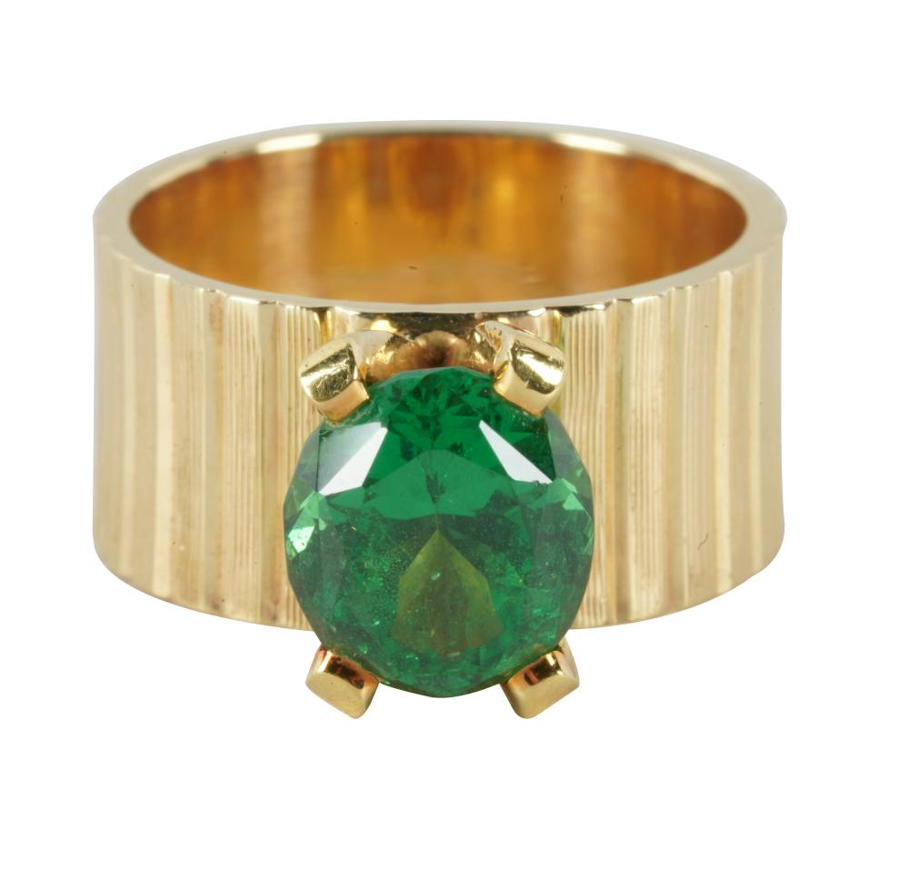 Appraisal: KARAT YELLOW GOLD TSAVORITE GARNET RINGcentering one oval Tsavorite garnet