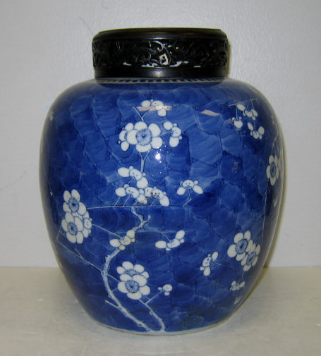 Appraisal: CHINESE BLUE AND WHITE PORCELAIN JAR Globular form prunus blossom