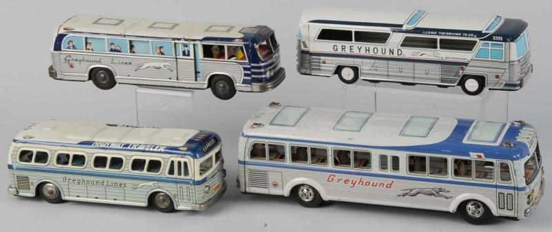 Appraisal: Lot of Tin Greyhound Bus Friction Toys Description Japanese Working