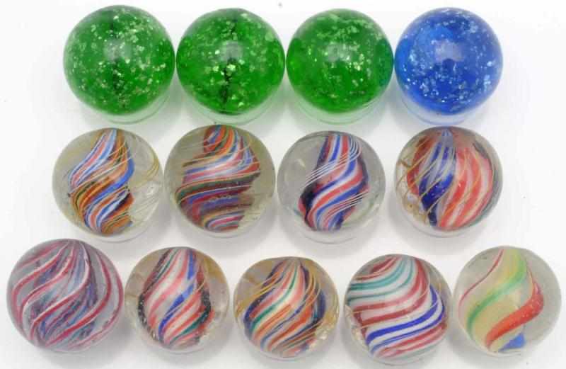 Appraisal: Lot of Assorted Handmade Marbles This lot includes three green