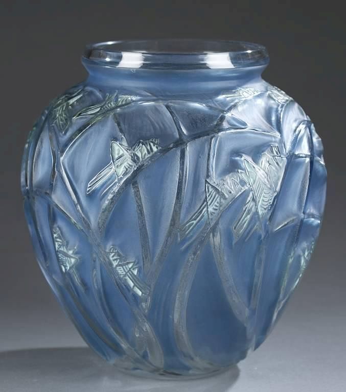 Appraisal: Lalique Sauterelles vase A Lalique Sauterelles vase c Sauterelles Glass