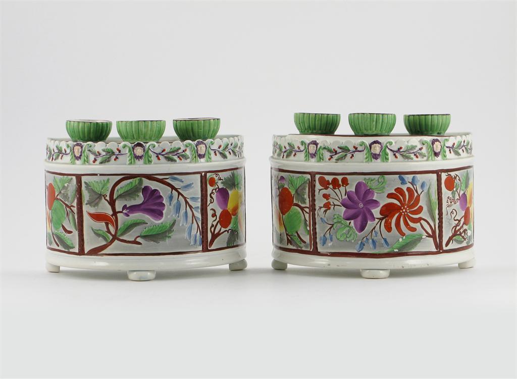 Appraisal: A good pair of pearlware bough pots and covers