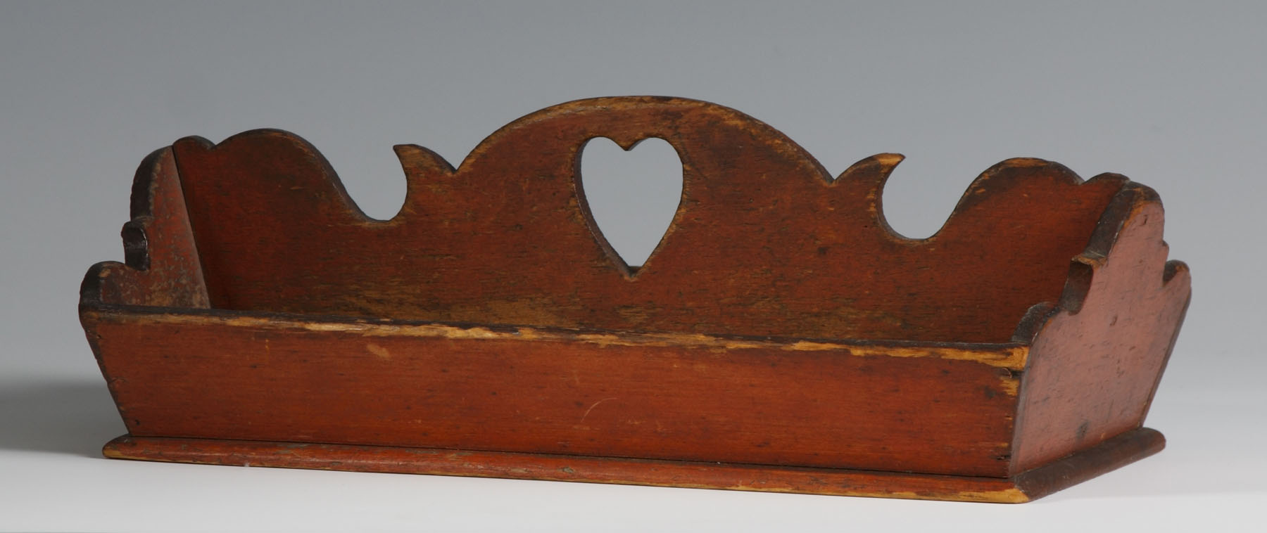 Appraisal: Carved Painted Cutlery Tray w Heart Cutout Canted Sides original