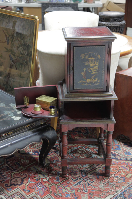 Appraisal: ORIENTAL STYLE SMOKING STAND Red lacquered stand having a door