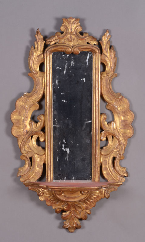 Appraisal: ITALIAN ROCOCO GILTWOOD MIRRORED BRACKET With a rectangular mirror plate