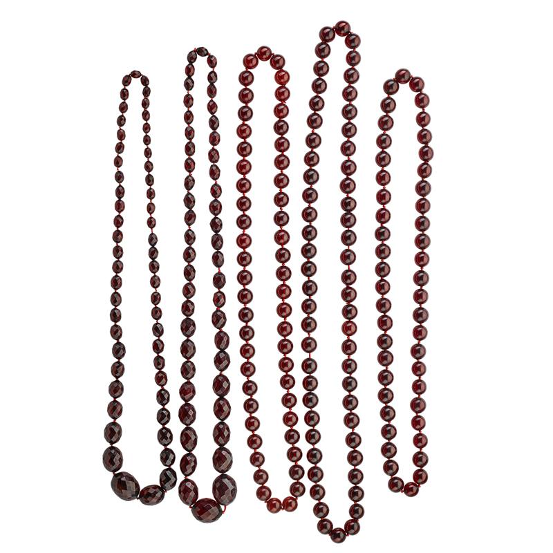 Appraisal: FIVE STRANDS OF BAKELITE BEADS TO RESEMBLE AMBER Condition Report