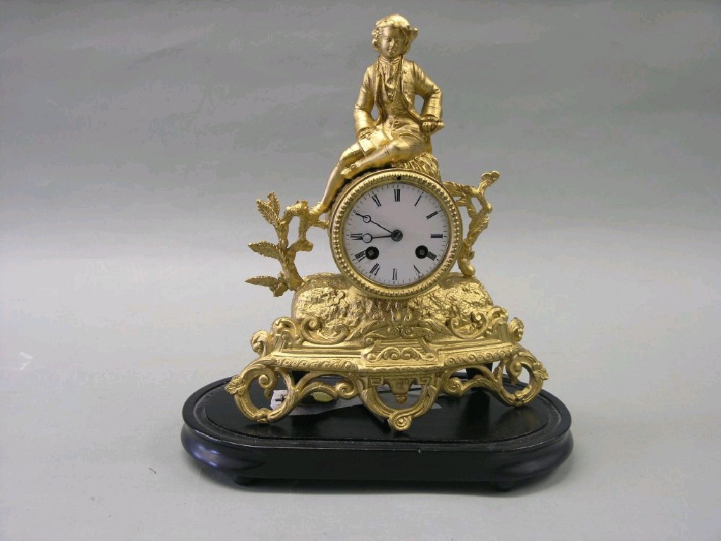 Appraisal: A th century gilt-spelter mantel clock with enamelled dial and