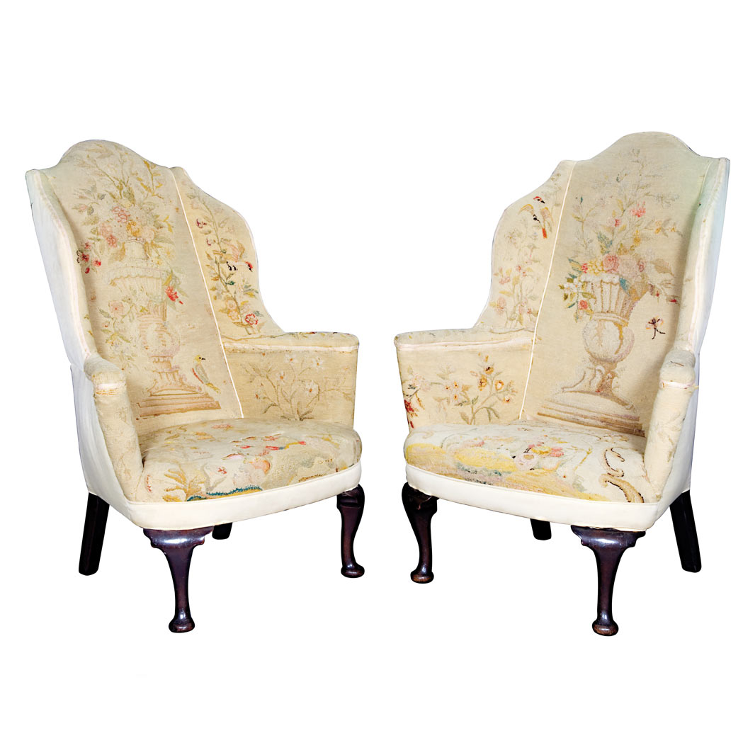 Appraisal: Pair of George II Style Walnut Wing Chairs Each arched