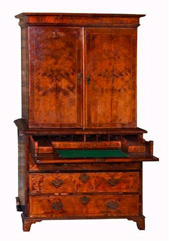 Appraisal: A GEORGE I SECRETAIRE CABINET in two parts the interior