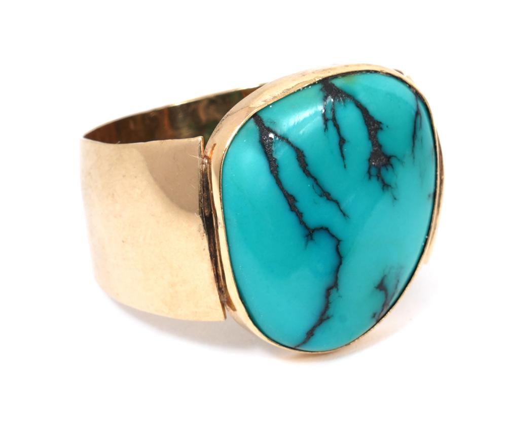 Appraisal: TURQUOISE KT YG GENTLEMAN'S RINGGentleman's free form bezel set turquoise