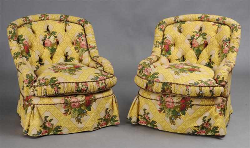 Appraisal: PAIR OF YELLOW-GROUND BUTTONED FLORAL AND TRELLIS PATTERN LINEN UPHOLSTERED