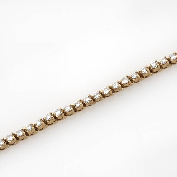 Appraisal: A diamond and k gold tennis bracelet estimated total diamond