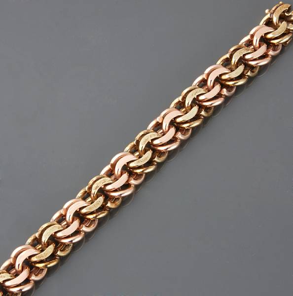 Appraisal: A k two-tone gold link bracelet g length in