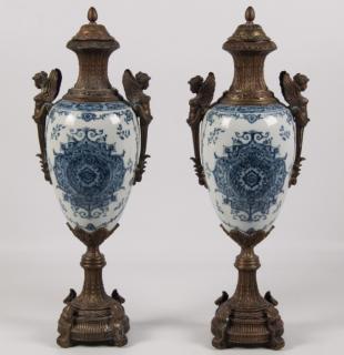 Appraisal: PAIR OF FRENCH STYLE PORCELAIN CAPPED URNS PAIR OF DECORATIVE