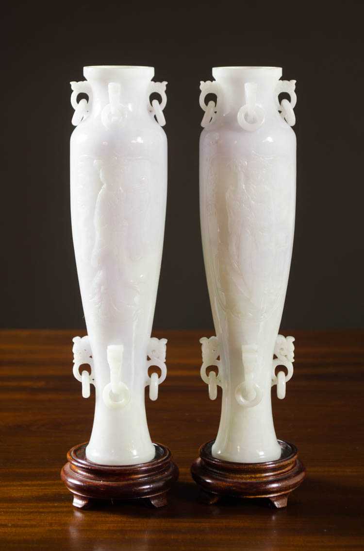 Appraisal: PAIR OF CHINESE LAVENDER GREEN JADEITE VASES with high shoulders