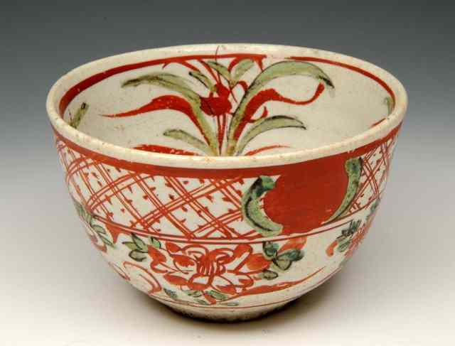 Appraisal: A SWATOW BOWL with iron red and green foliate designs