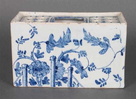 Appraisal: English blue and white Delftware flower brick circa floral and