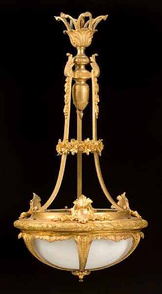 Appraisal: A gilt bronze and opaline glass chandelier The leaf cup