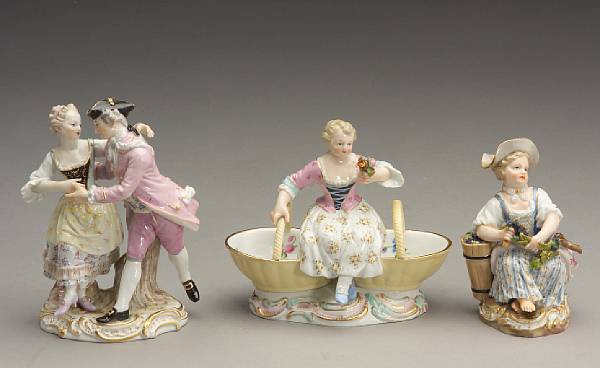 Appraisal: A Meissen porcelain group and two figures late th century