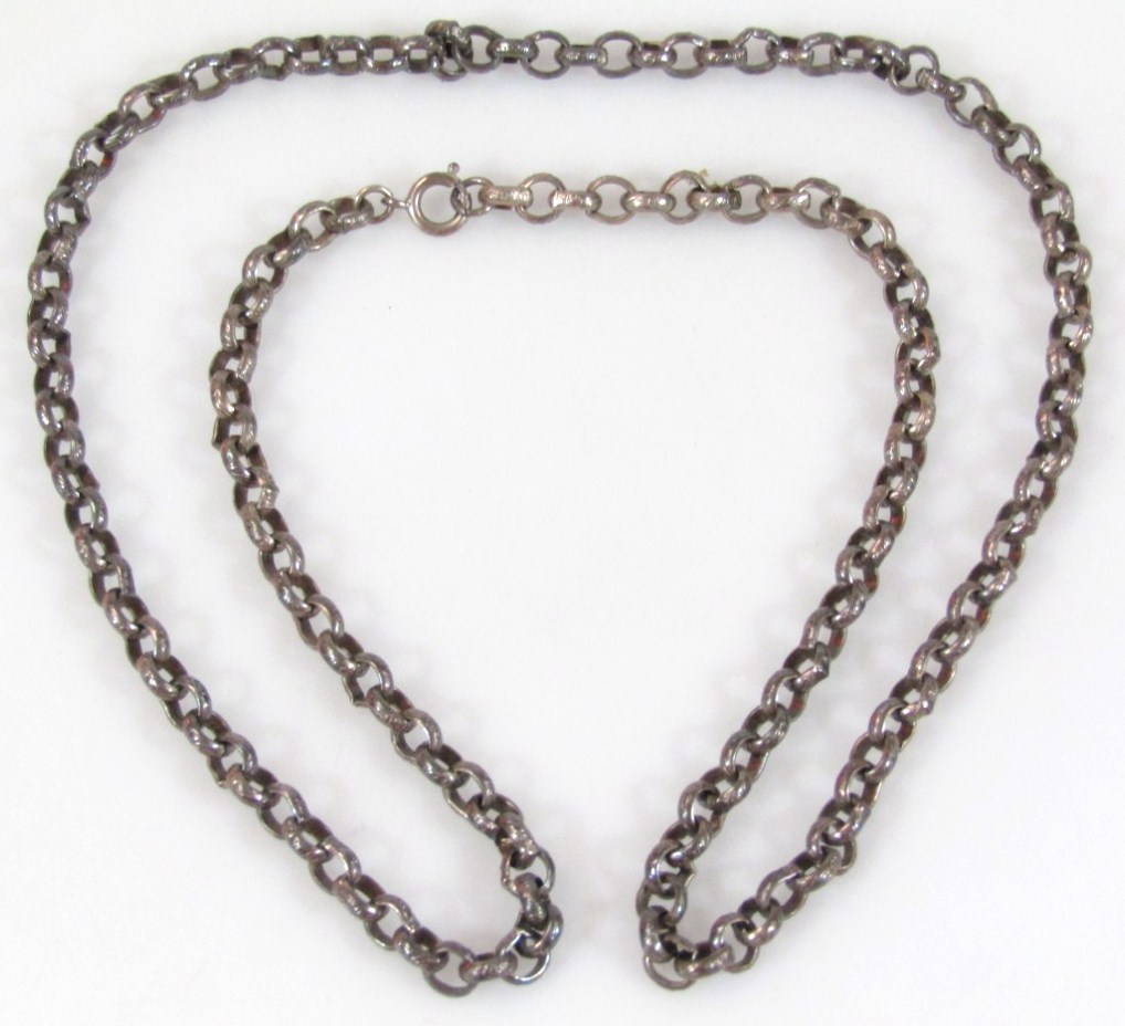 Appraisal: A heavy metal link watch chain the clasp probably marked