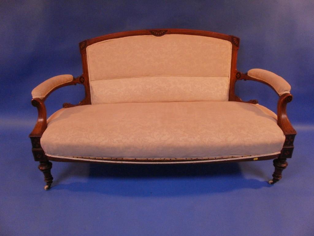 Appraisal: A Victorian inlaid walnut settee with low turned front supports