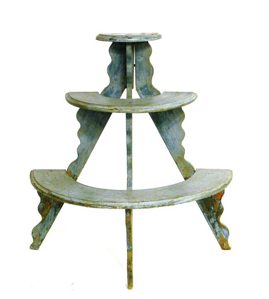 Appraisal: Rustic graduated three-tier demilune plant stand in green paint pine