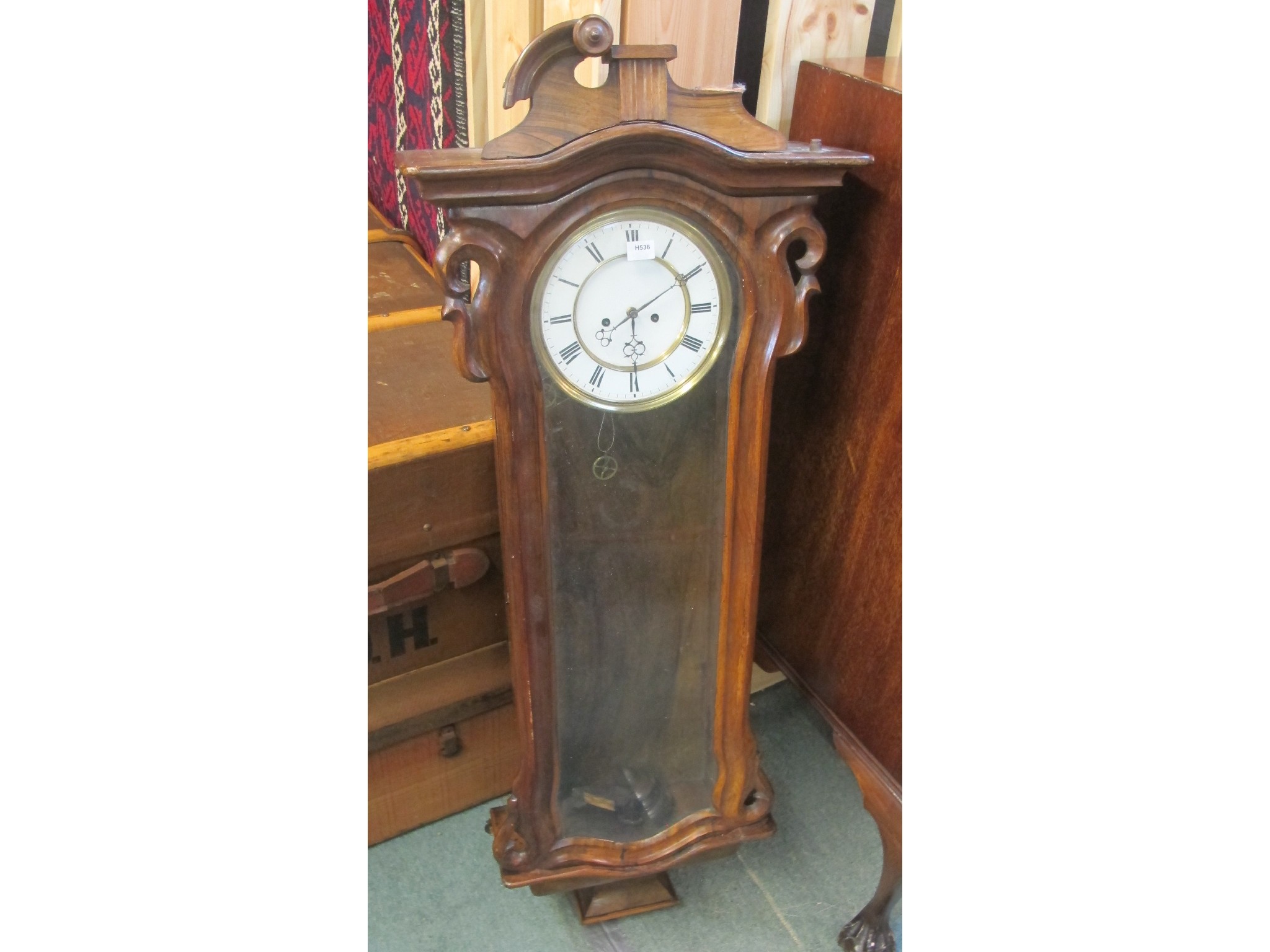 Appraisal: A Victorian walnut wall clock