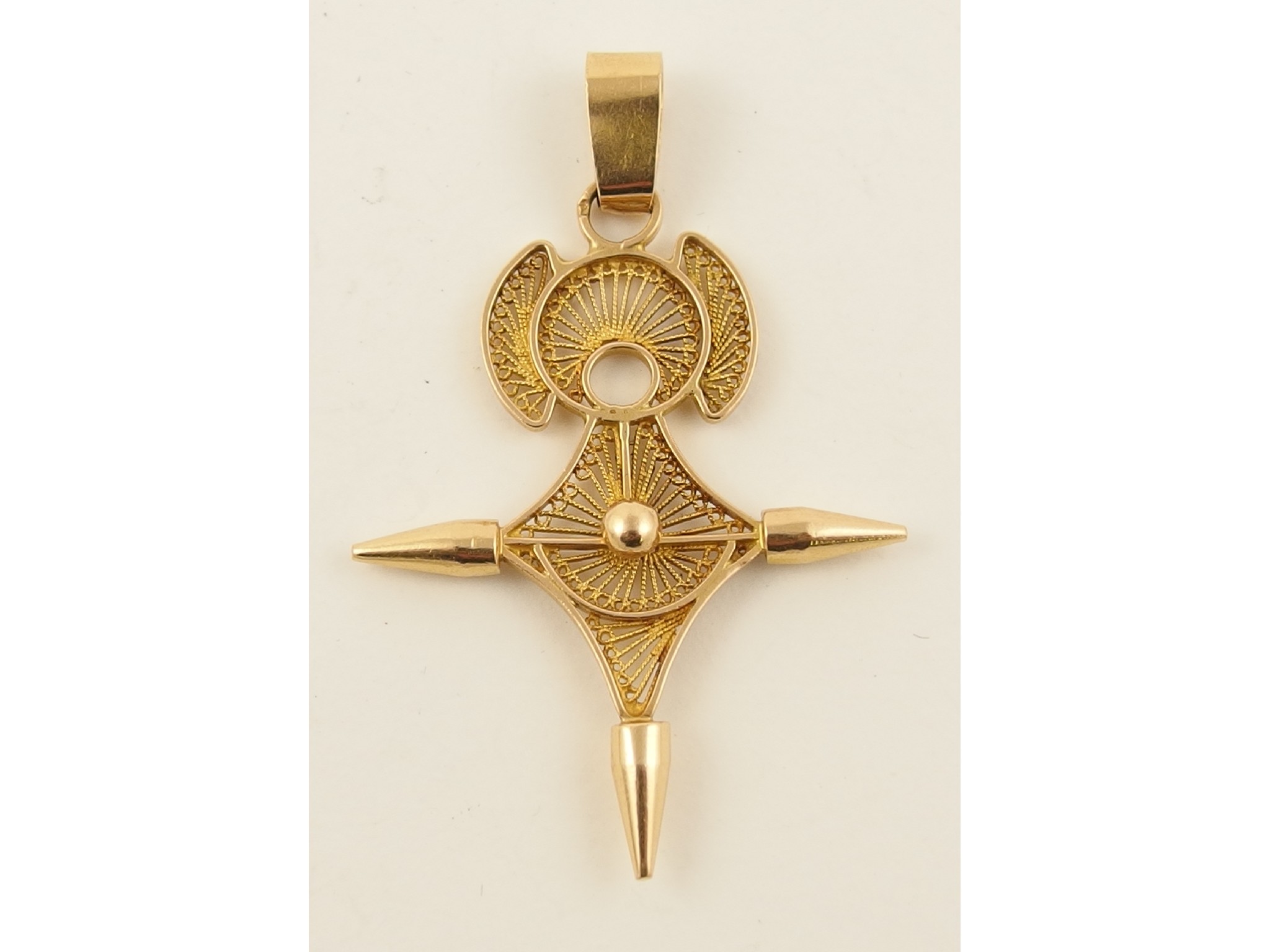 Appraisal: An African possibly Liberian yellow metal pendant with indistinct hallmarks