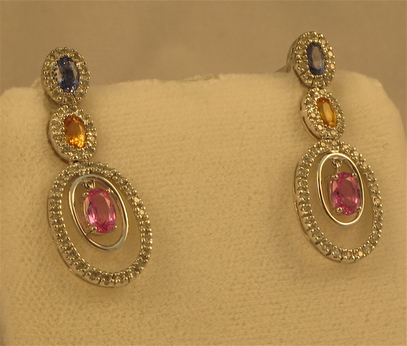 Appraisal: PAIR OF FANCY SAPPHIRE DIAMOND AND FOURTEEN KARAT WHITE GOLD