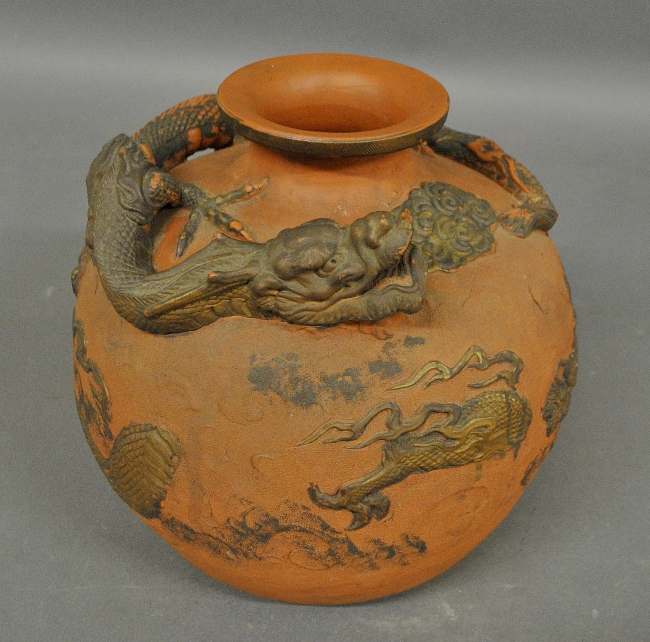 Appraisal: - Asian redware pottery vase decorated with raised dragons h