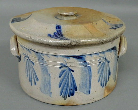 Appraisal: Covered stoneware cake crock th c with blue floral decoration