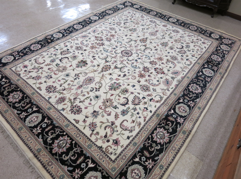 Appraisal: HAND KNOTTED ORIENTAL CARPET Indo-Persian overall floral Isfahan design on