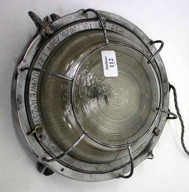 Appraisal: AN ALUMINIUM SHIPS BULKHEAD LAMP cm diameter