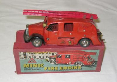 Appraisal: A Minic Fire Engine tin plate clockwork powered and battery