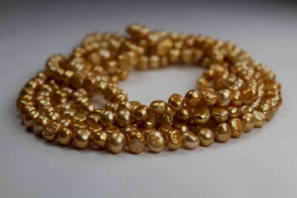 Appraisal: inch Strand of Gold Freshwater Pearl Necklace Unusual inch Strand