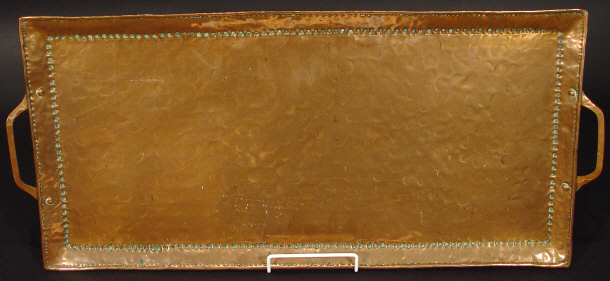 Appraisal: Rectangular John Pearson two handled copper tray with hammered decoration