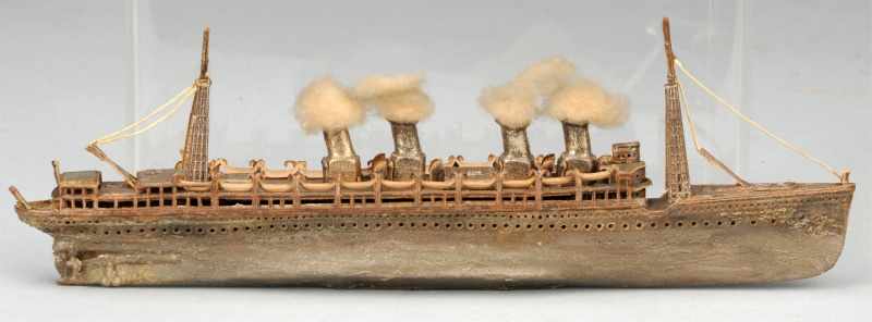 Appraisal: Dresden Battleship Christmas Ornament Description With four smoke stacks Very