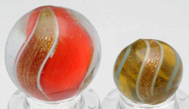 Appraisal: Lot of Lutz Marbles Smaller marble is an unusual yellow