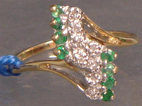 Appraisal: K YG diamond and emerald ring diamonds emeralds about pts