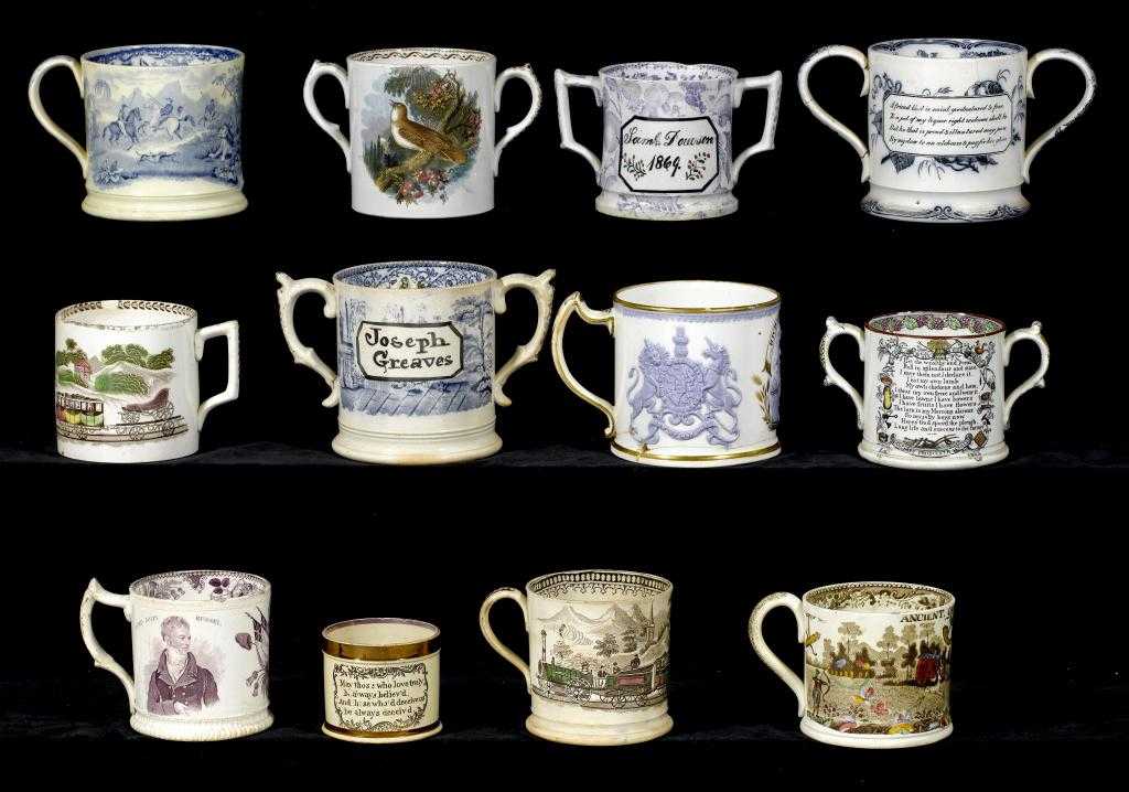 Appraisal: ELEVEN EARTHENWARE MUGS AND LOVING CUPS including frog-and-newt examples one