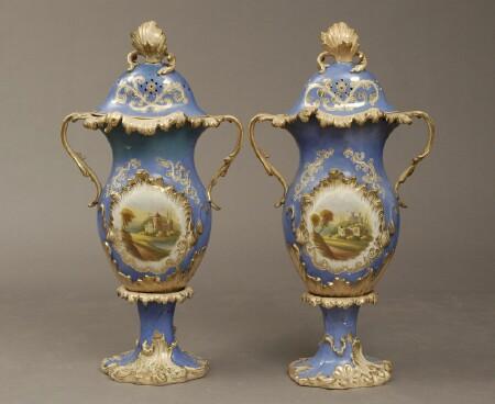 Appraisal: Pair of Rockingham-Type Blue-Ground Gilt and Polychrome Decorated Ceramic Two-Handled