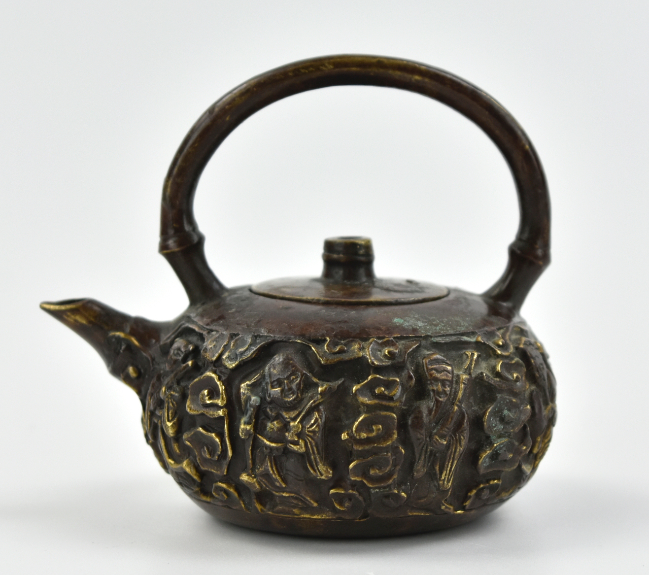 Appraisal: Chinese th C a compressed globular shaped bronze teapot carved