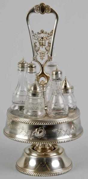 Appraisal: Wilcox Victorian Rotating Condiment Holder Description Silver-plated Complete with six