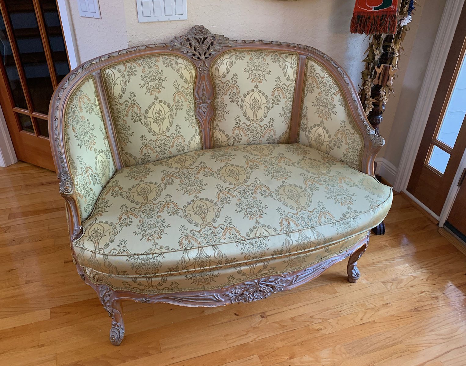 Appraisal: FRENCH CARVED SETTEE Carved French settee having a pierced bouquet