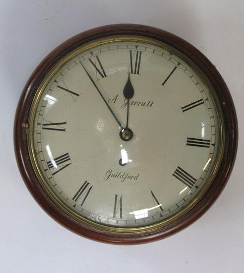 Appraisal: A MAHOGANY CASED DIAL CLOCK with a white enamel dial