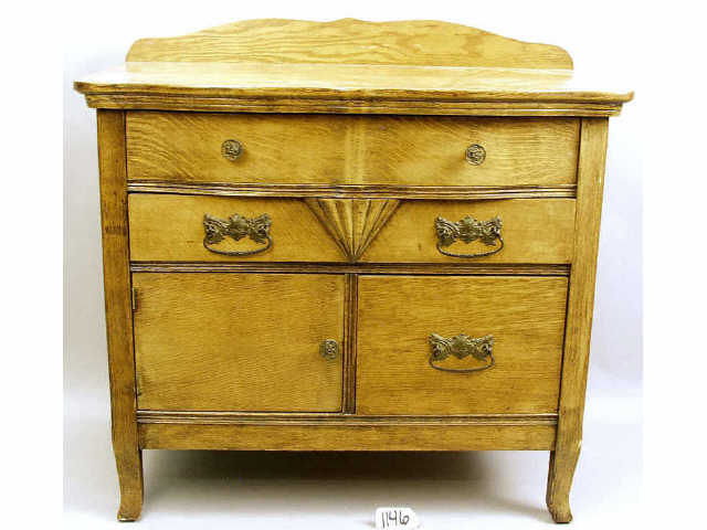 Appraisal: Circa oak triple serpentine wash stand with original hardware Estimate