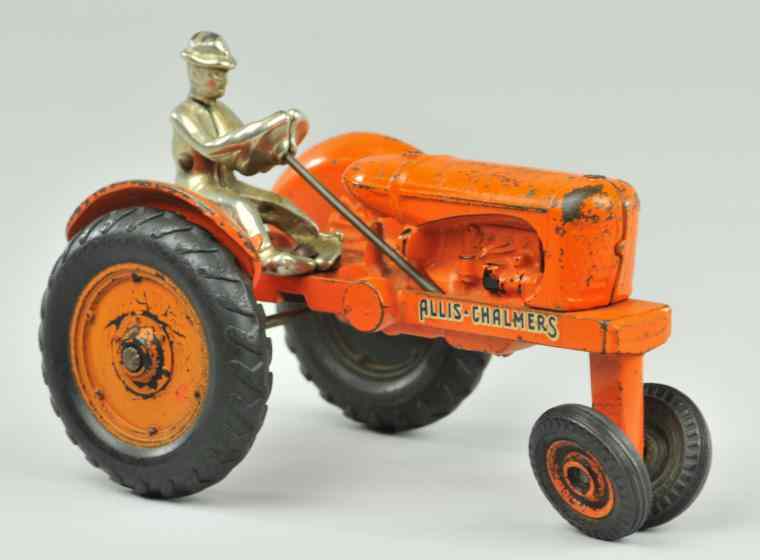 Appraisal: ARCADE ALLIS CHALMERS TRACTOR c cast iron painted in Persian