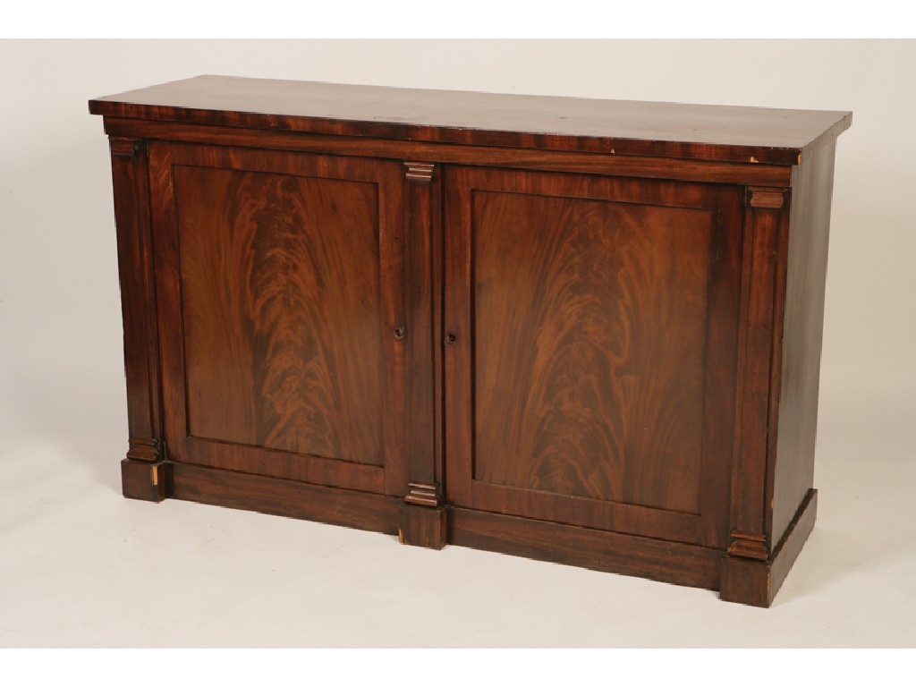 Appraisal: A REGENCY MAHOGANY SIDEBOARD the rectangular top above twin panelled