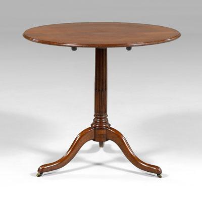 Appraisal: French mahogany tilt-top tea table single-board mahogany top tilting over